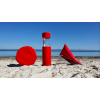 Les 3 poufs de plage  framboise sur le sable