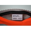 Vue de l'intérieur de la trousse isocèle grise, orange et noire avec son étiquette