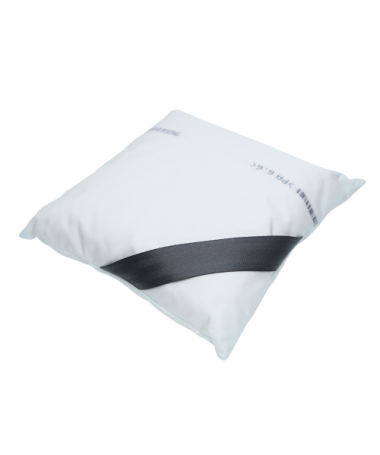 Coussin blanc et gris posé