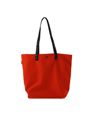 Vue face avant du cabas en toile de store orange, anses cuir amovibles.