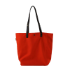 Vue face avant du cabas en toile de store orange, anses cuir amovibles.