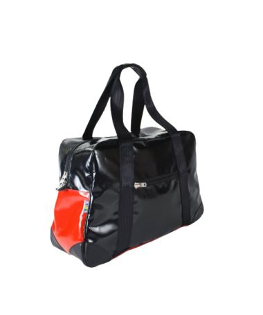 Vue de biais du sac polochoin en bâche de train de marchandise noir et rouge (rouille)
